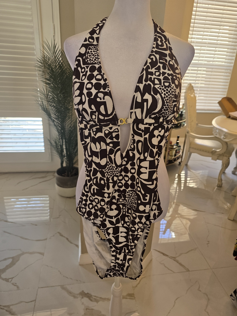 Trina Turk Black and White Graphic Halter One-Piece Swimsuit with Gold Clasp